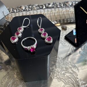 Sterling silver and pink topaz earrings and ring set.  Size 7 ring.  Beautiful